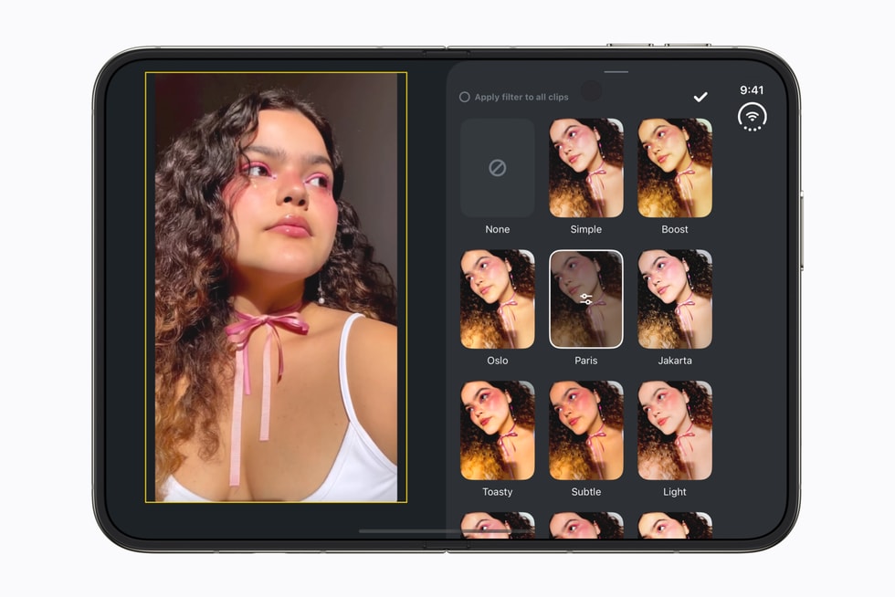 Edits on a fully opened iPhone Duo showing a video preview beside filter choices.